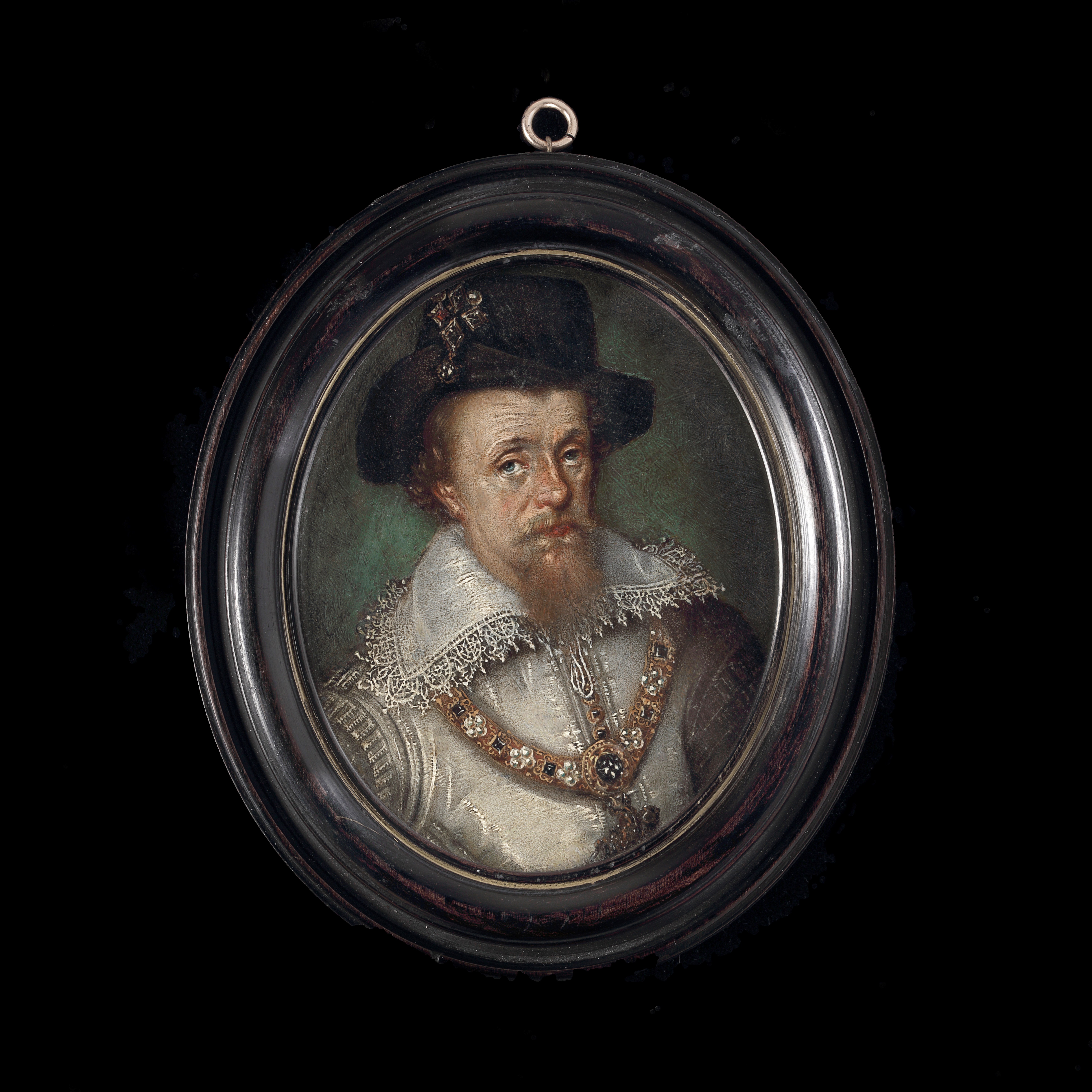 James VI/I of Scotland and England, wearing a silver doublet, white lace ruff, and a black hat with the ‘Mirror of Great Britain’; circa 1635